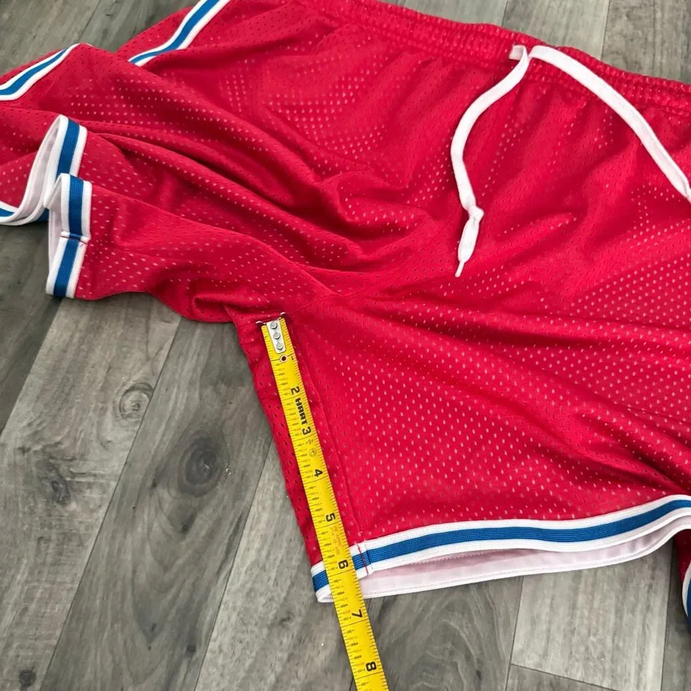 Vintage retro Nike red mesh shorts with blue piping